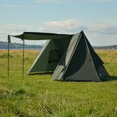 DD Superlight A-Frame Tent setup in grassy field, featuring a lightweight design for 2 campers and versatile entrances.